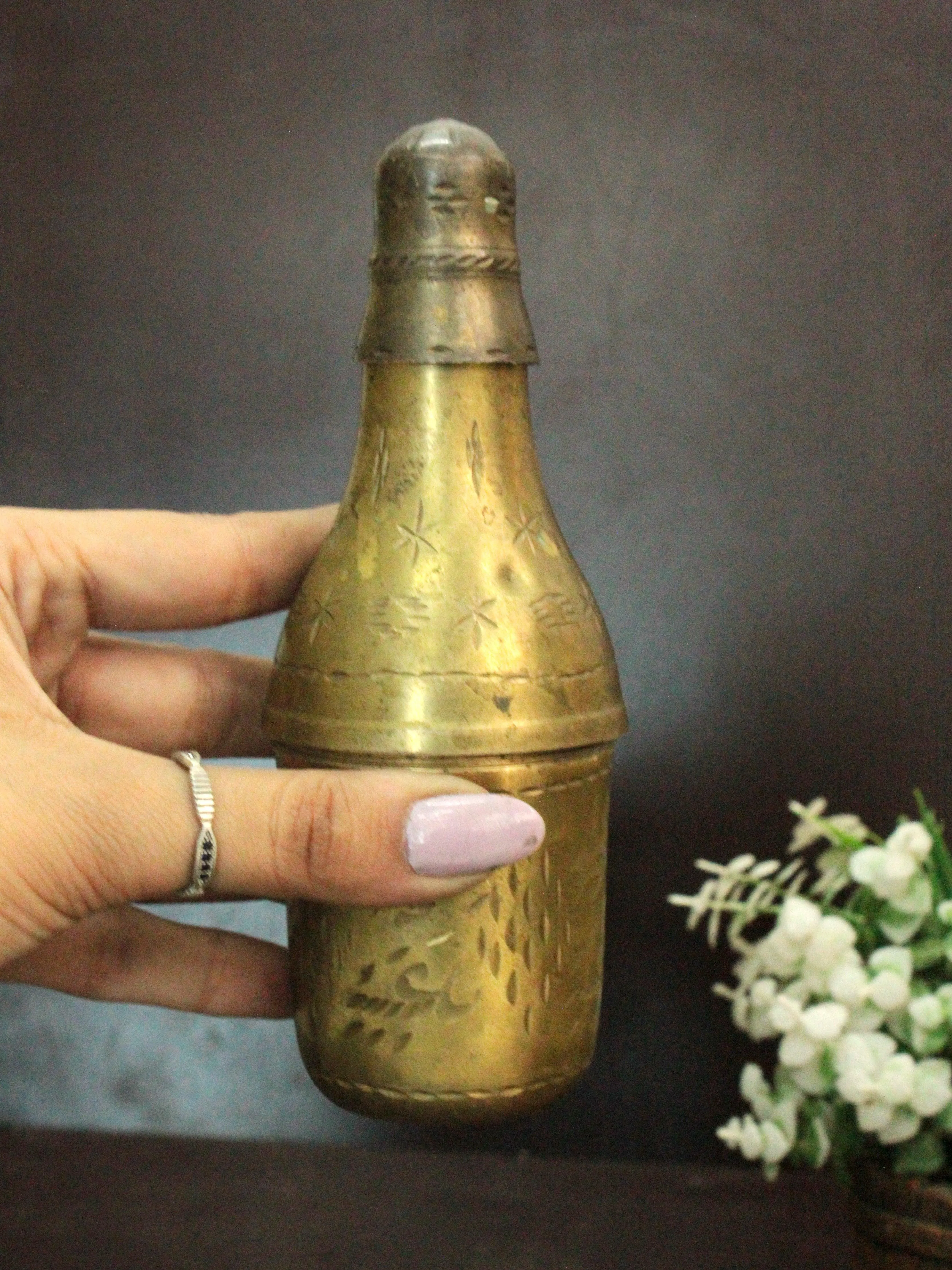 Elegant Brass Bottle Planter: A Unique Decorative Piece with Dual Functionality