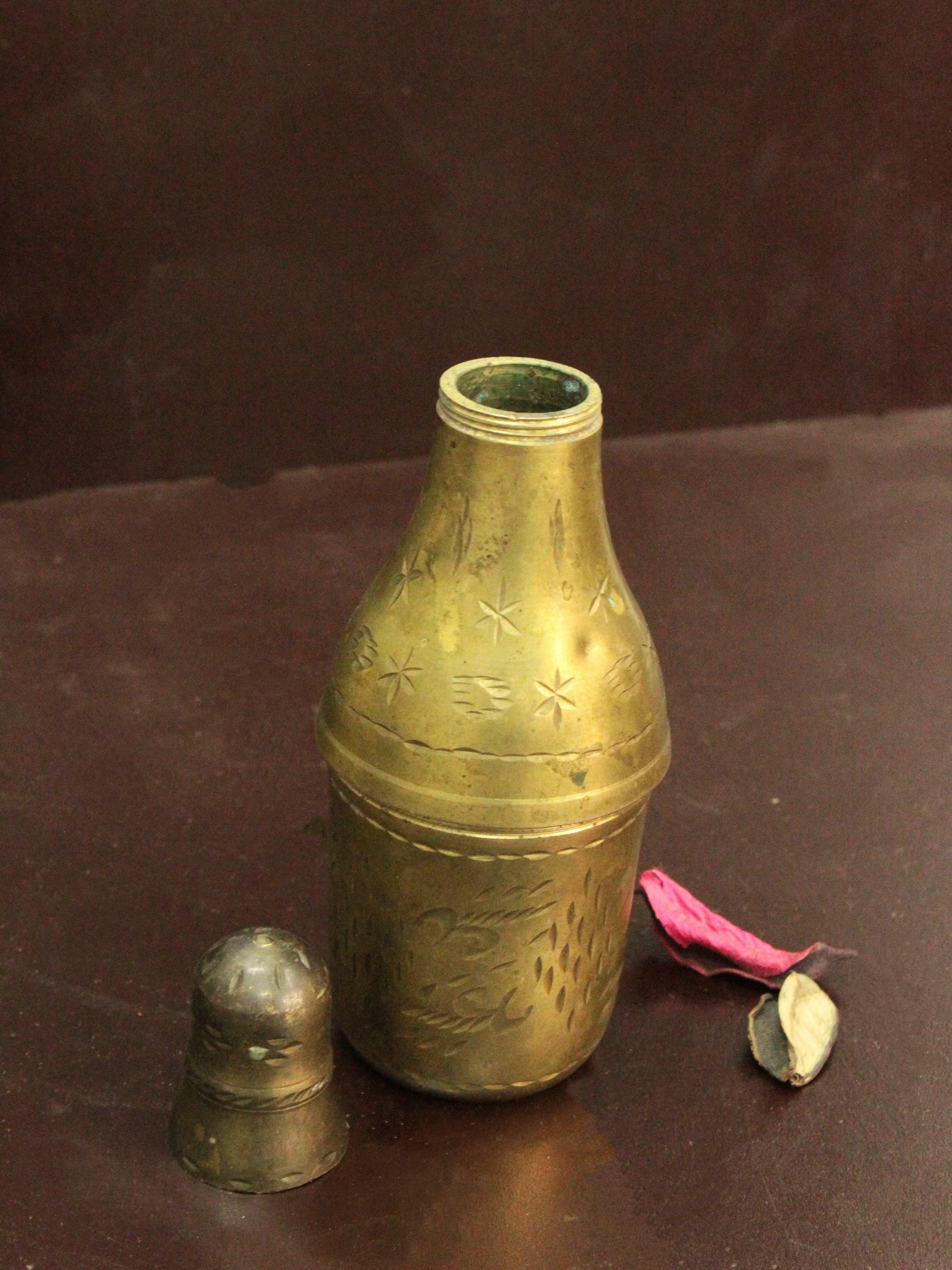 Elegant Brass Bottle Planter: A Unique Decorative Piece with Dual Functionality