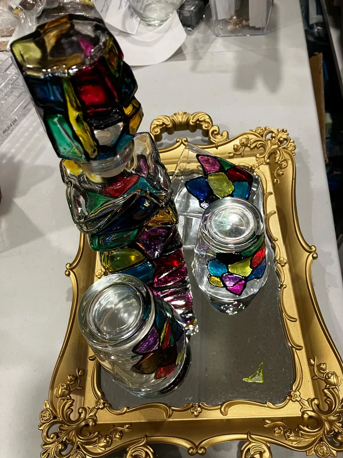 Stained glass painted bottle with 4 drinking glasses and golden tray